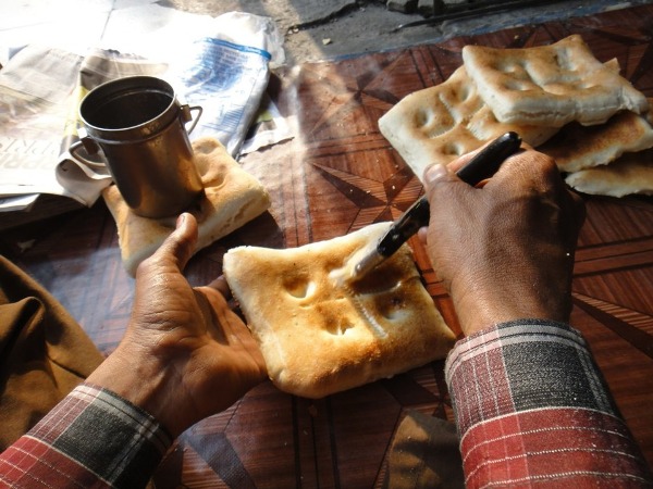 Buttering a pav